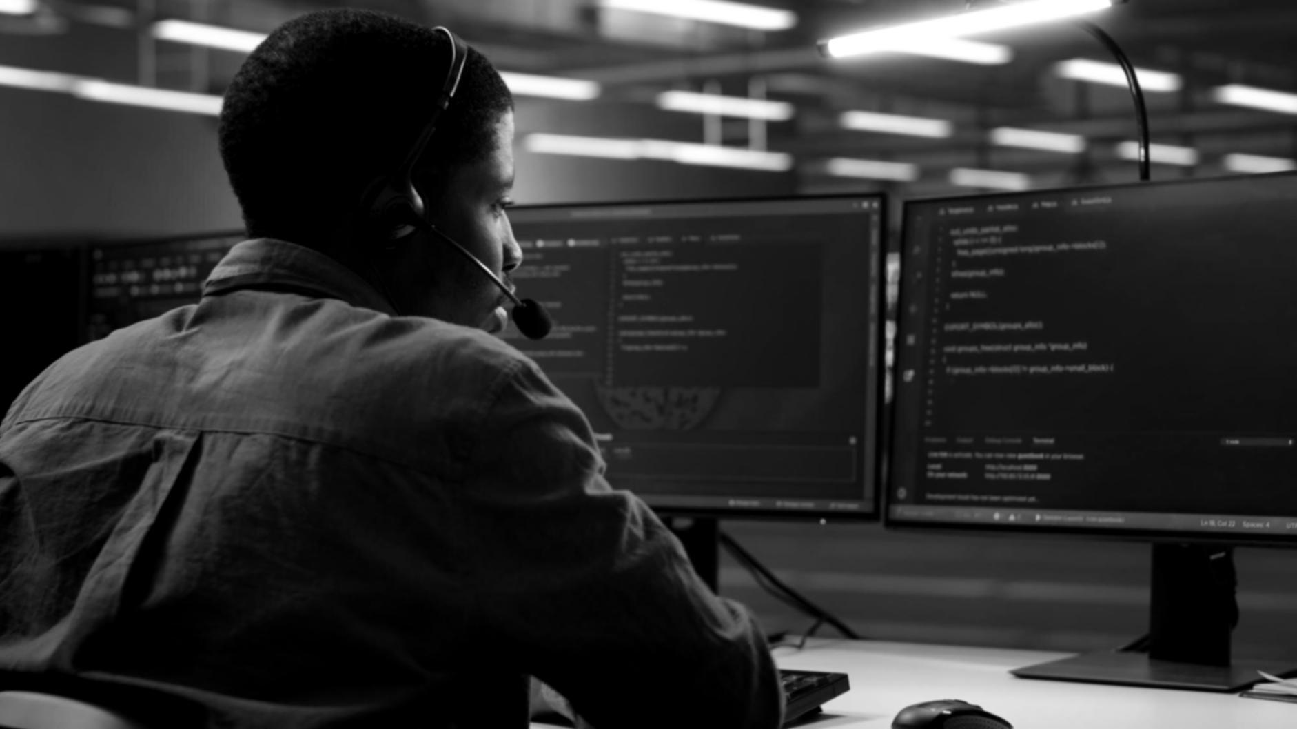 Smart contract development environment showing code review and blockchain integration